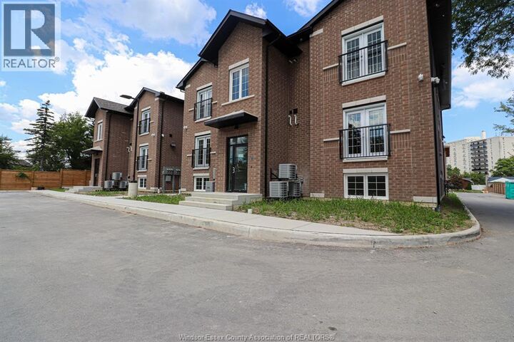 Property Photo:  233 Watson 103  ON N8S 3R8 