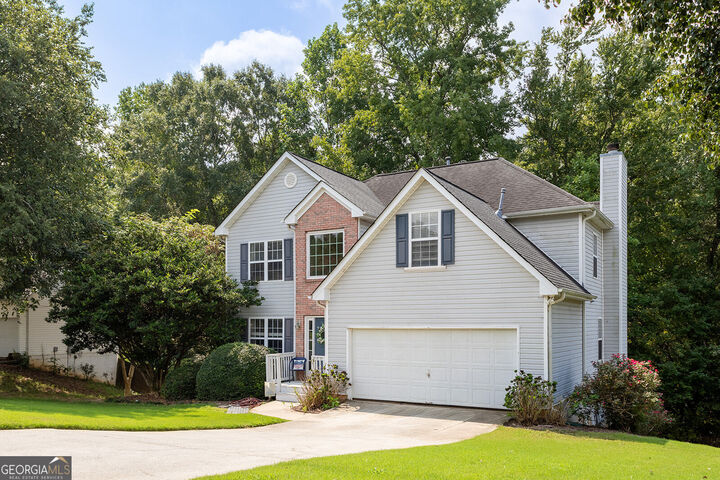 Property Photo:  654 Weaver Falls Court  GA 30052 