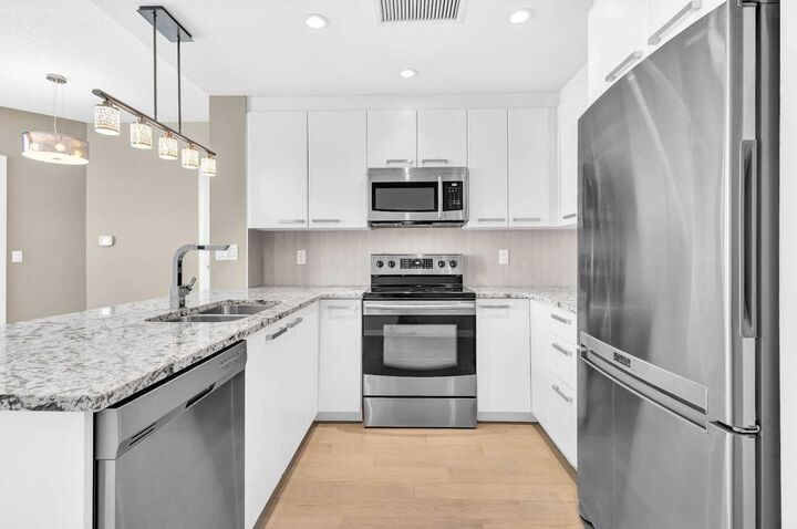Property Photo:  225 11 Avenue SE 703  AB T2G 0G3 