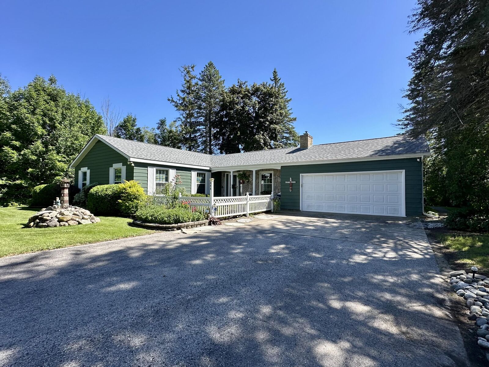 Property Photo: 444 Riverside Drive MI 49721