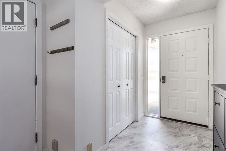 Property Photo: 10401 19 Street Southwest AB T2W 3E7