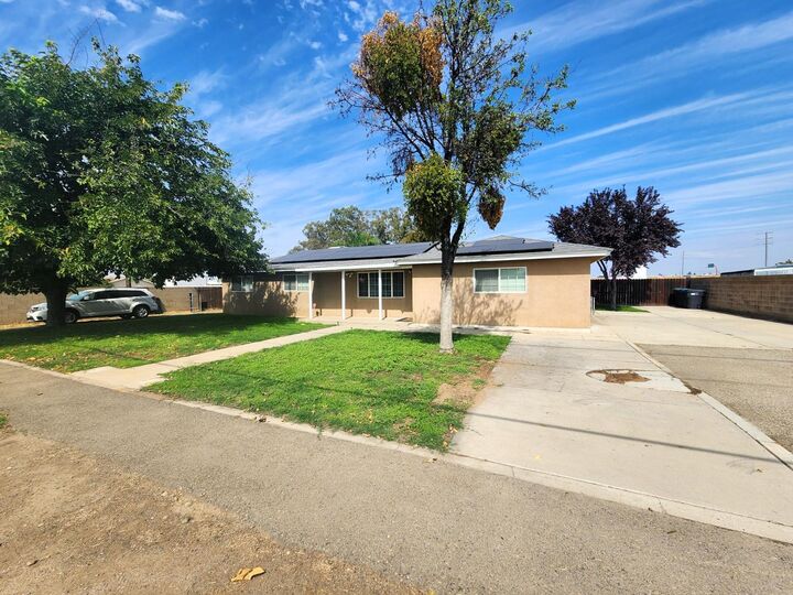 Property Photo:  5771 Belmont Avenue  CA 93727 