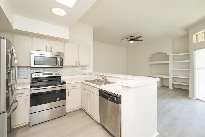 Property Photo: 7230 Westpointe Boulevard 1233 FL 32835