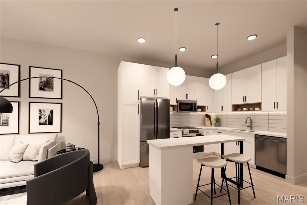 Property Photo:  1121 S Main Street 209  MO 63301 