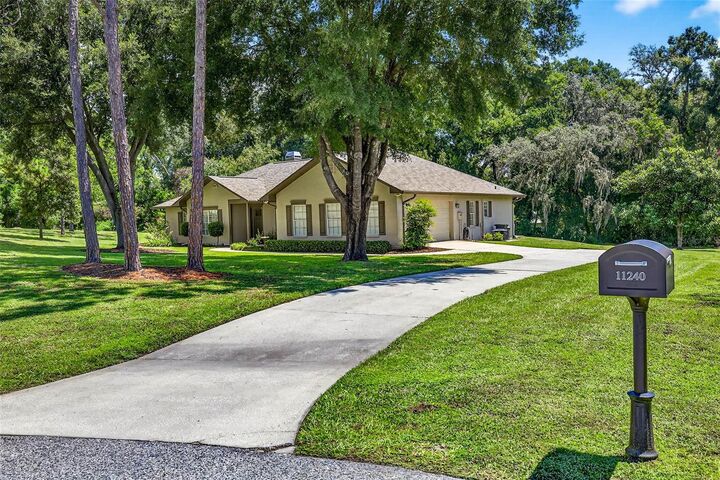 Property Photo: 11240 Grandview Dr FL 33525