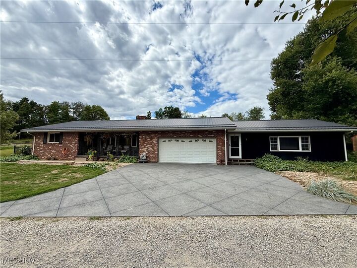 Property Photo: 8004 Reef Road NE OH 44651