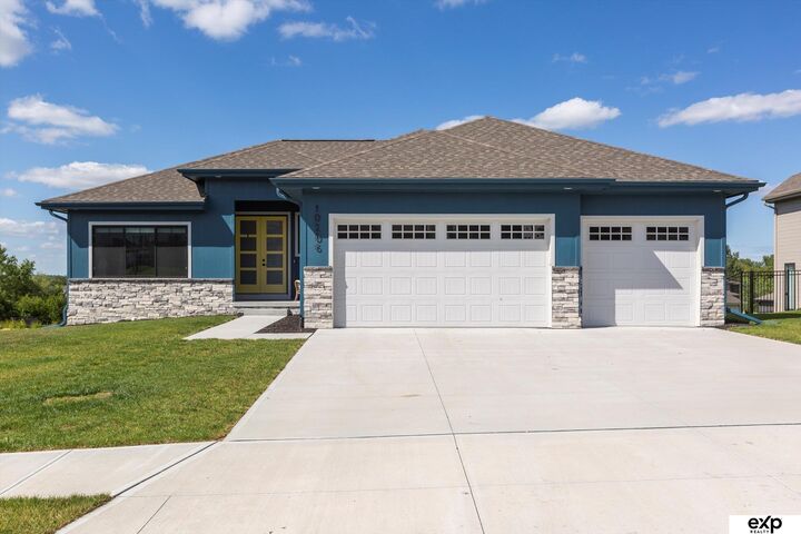 Property Photo: 10206 Longshore Avenue NE 68046