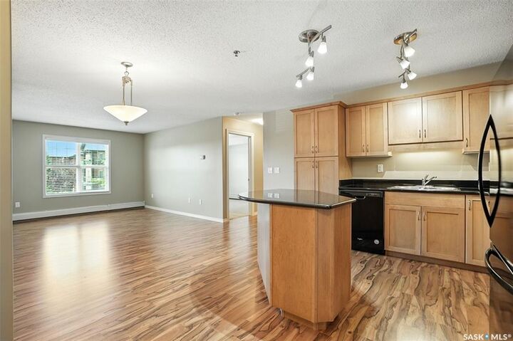Property Photo: 103 Wellman Crescent 215B SK S7T 0C1