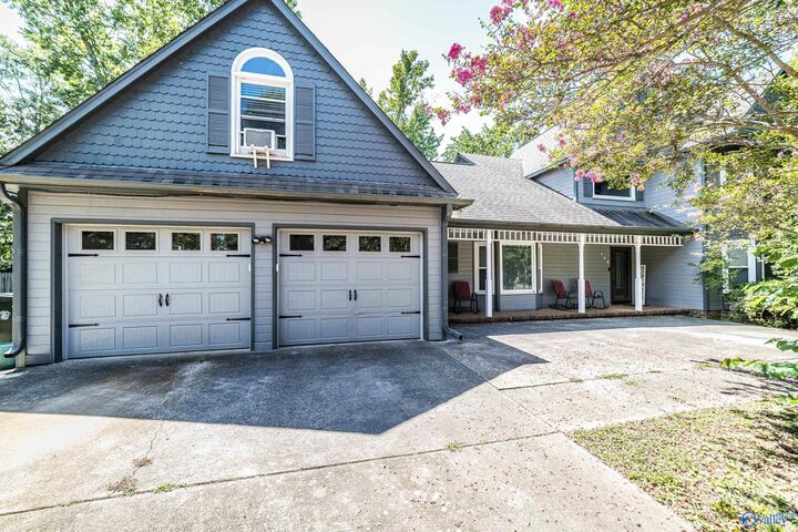Property Photo: 122 Kingswood Drive NW AL 35806