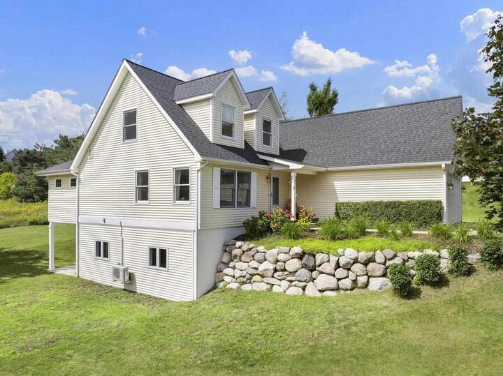 Property Photo:  5976 Walloon Meadow  MI 49770 