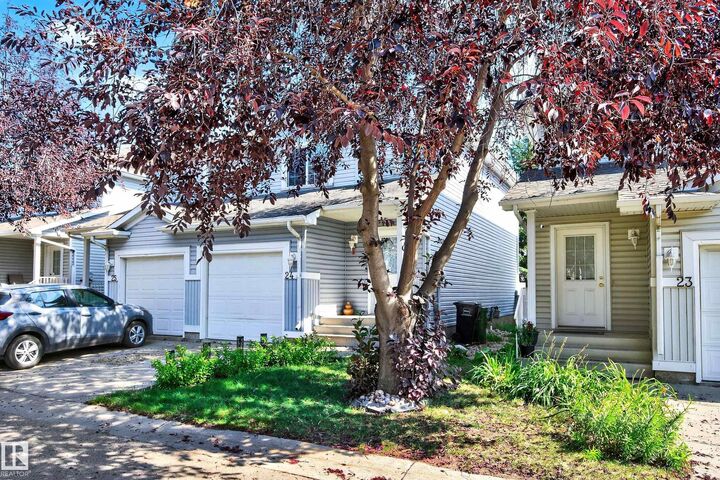 Property Photo: 14603 Miller Boulevard NW 24 AB T5Y 3B6