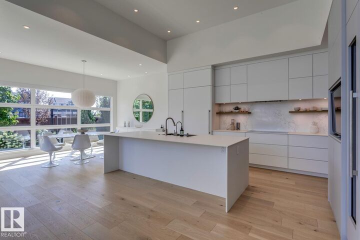 Property Photo: 682 Howatt Drive SW AB T6W 3K3