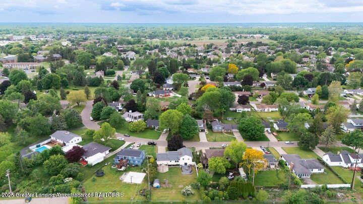 Property Photo:  515 Chanticleer Trail  MI 48917 