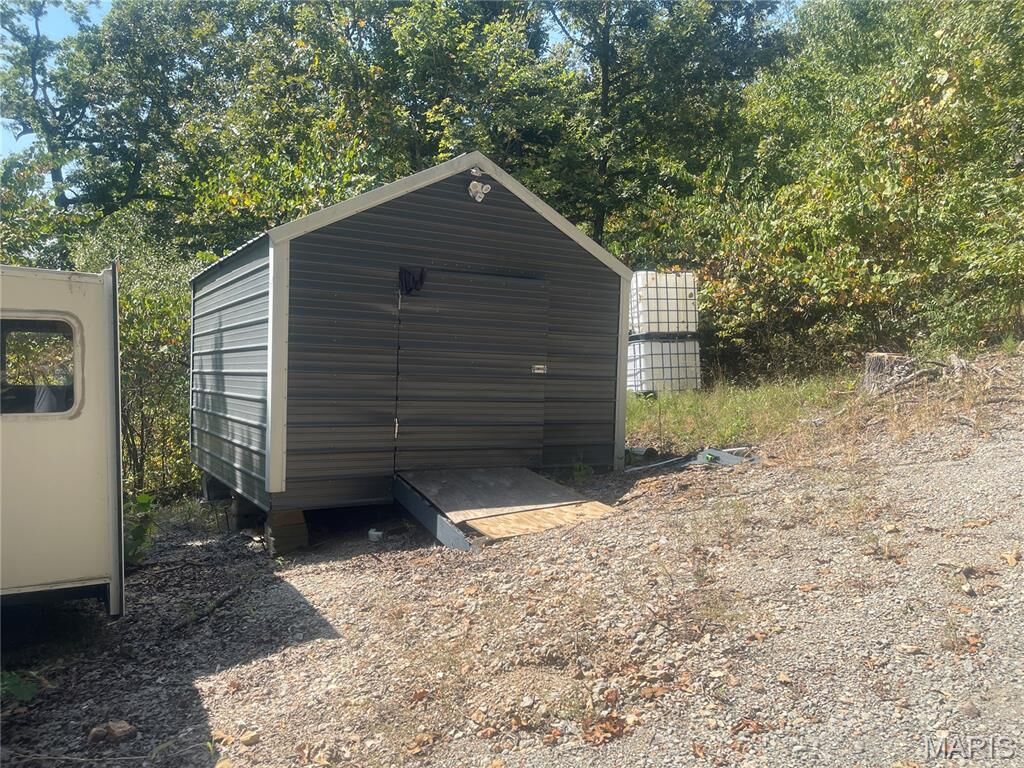 Property Photo:  9220 Mulqueen Lane  MO 63036 