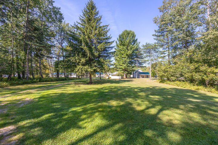 Property Photo:  6825 Riverside Road  MI 49631 