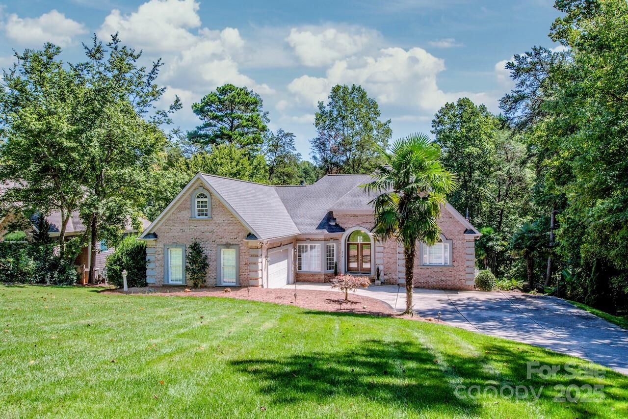 Property Photo:  214 Wildwood Cove Drive  NC 28117 