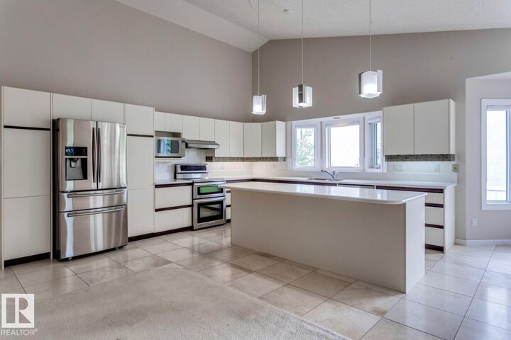 Property Photo: 12416 29A Avenue NW AB T6J 6C6
