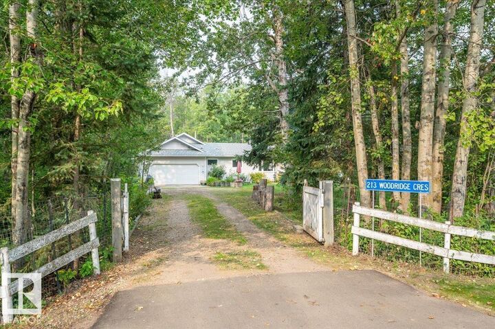 Property Photo: 57303 Rge Road 233 213 AB T0A 1N0