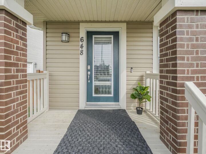 Property Photo: 648 Lewis Greens Drive NW AB T5T 7G4