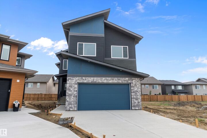 Property Photo: 2547 209 Street NW AB T6M 2K7