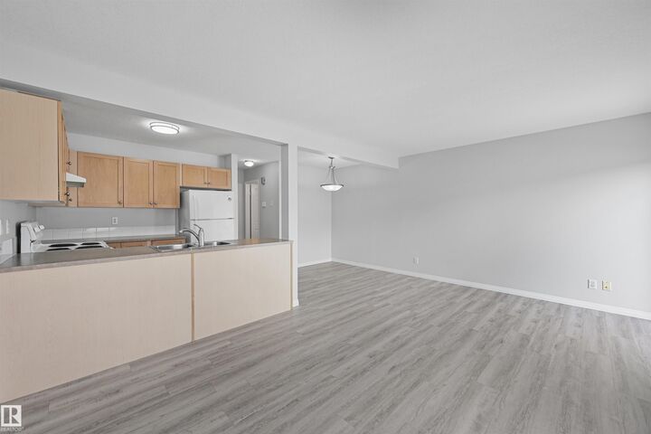 Property Photo: 230 Edwards Drive SW 15 AB T6X 1G7