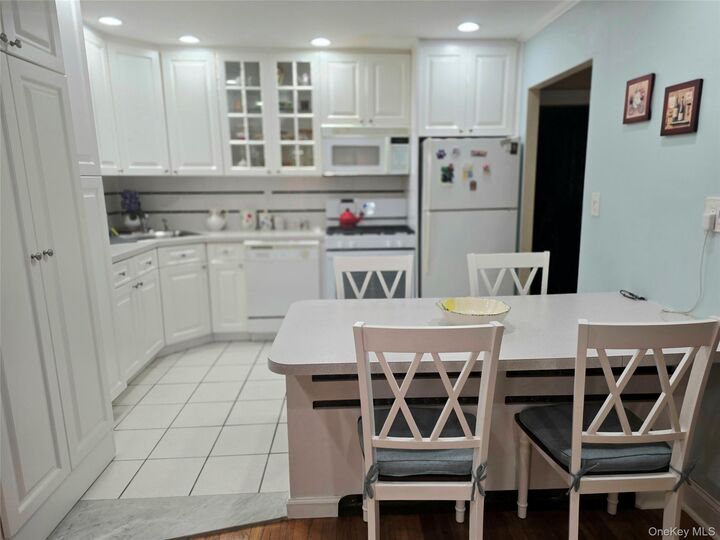 Property Photo:  18-21 215th Street Th 24  NY 11360 