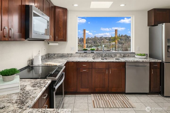 Property Photo:  3022 SW Bradford Street 401  WA 98126 