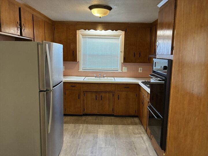 Property Photo: 70 W Selden St 1 MA 02126