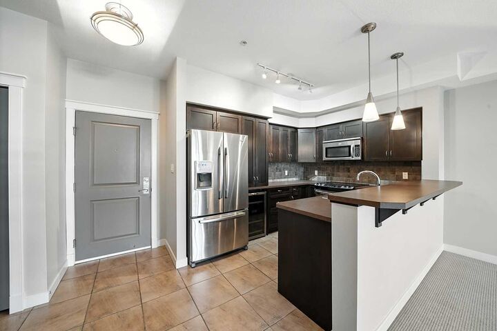 Photo de la propriété: 100 Lakeway Boulevard 218 AB T4S 0A4