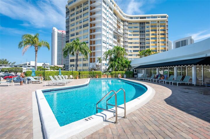 Property Photo:  100 Golden Isles Dr 104  FL 33009 