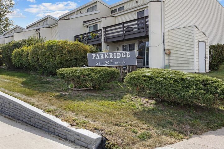 Property Photo:  51 29th Ave Drive SW 20  IA 52404 