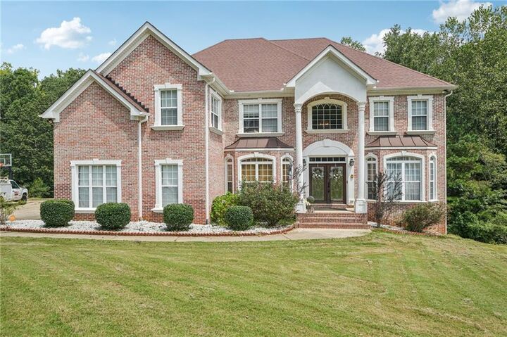 Property Photo:  216 Johns Creek Lane  GA 30281 