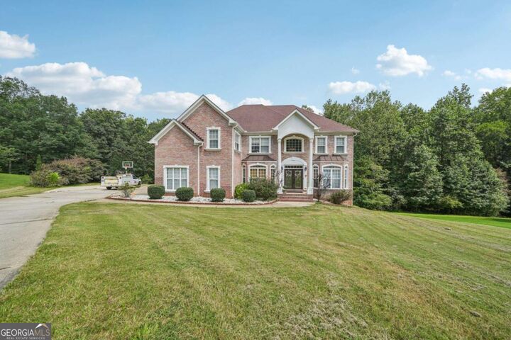 Property Photo:  216 Johns Creek Lane  GA 30281 