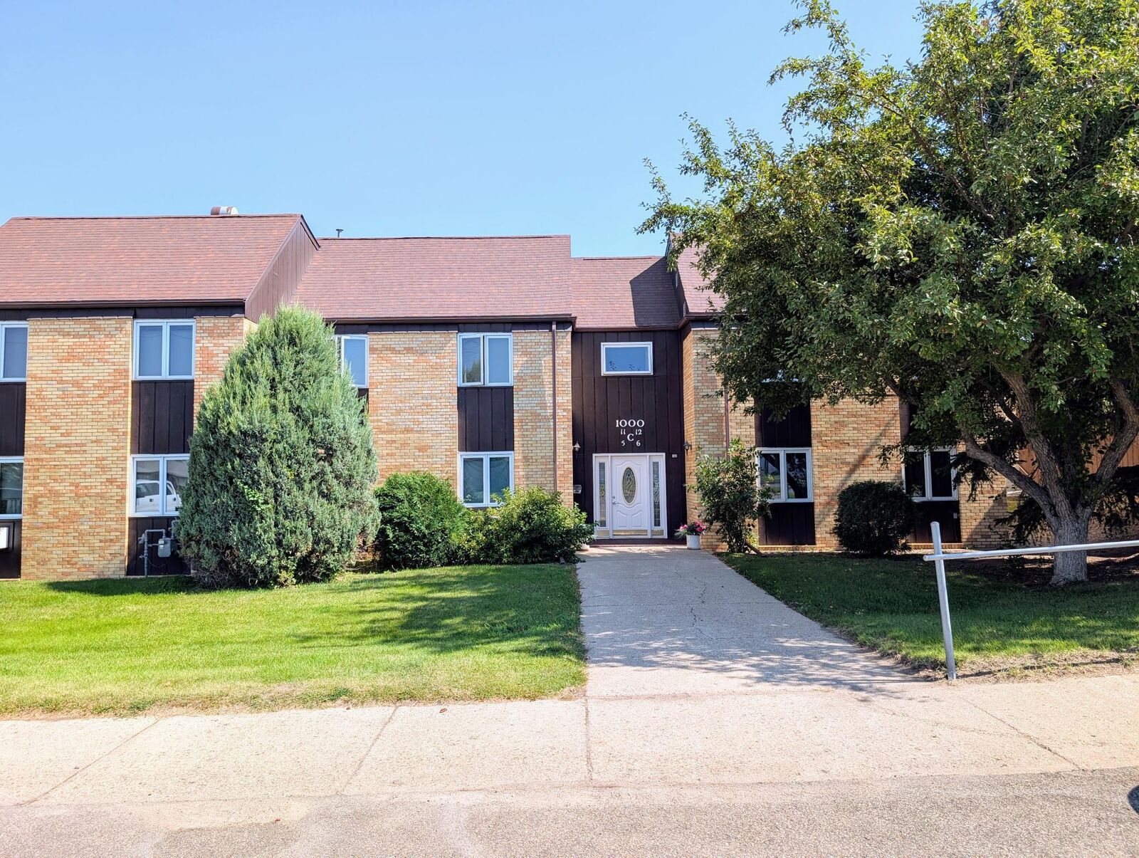Property Photo:  1000 20th Ave Unit C12 NW Unit C12  ND 58703 