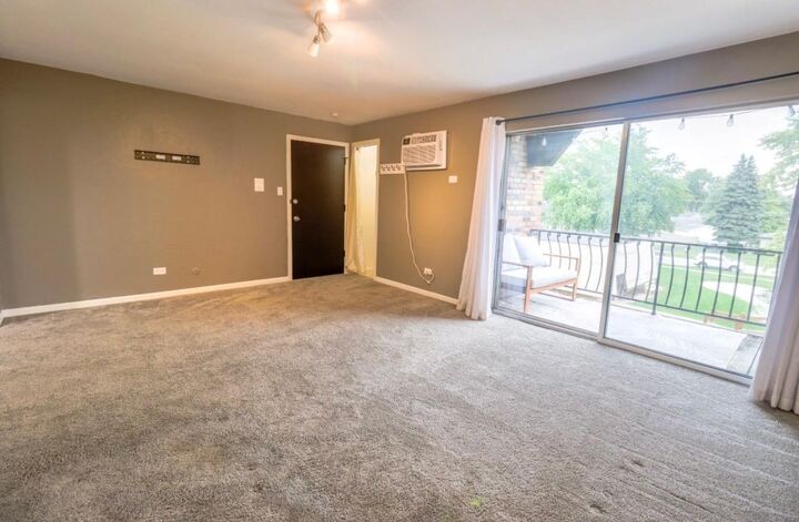 Property Photo:  7314 Blackstone Avenue 30  IL 60458 