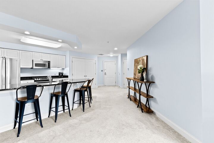Property Photo:  501 Commerce Dr. 4-215  MA 02184 