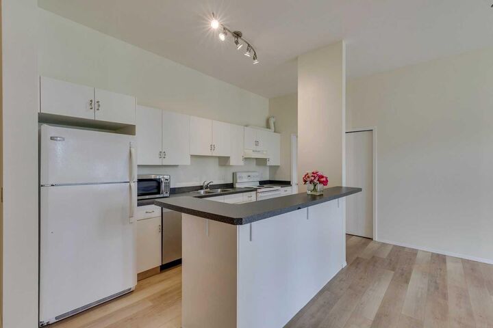 Property Photo: 1410 2 Street SW 313 AB T2R 1R1