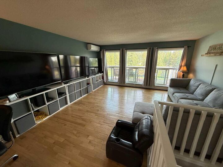 Property Photo:  106 West River Road  AB T7V 1Z1 