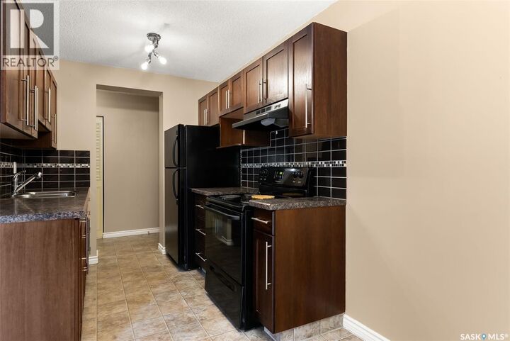 Property Photo:  6 1953 Garnet Street  SK S4T 2Z5 