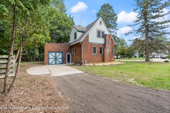 Property Photo:  2220 Delta River Drive  MI 48906 