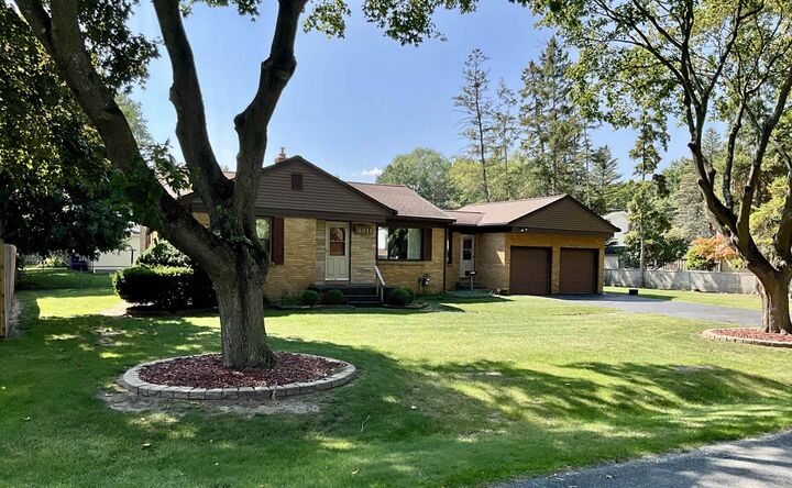 Property Photo:  4811 Corcoran Street  MI 48638 