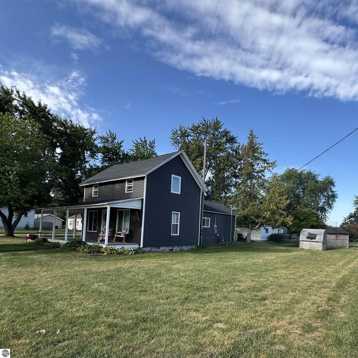 Property Photo:  210 S Adams  MI 48858 