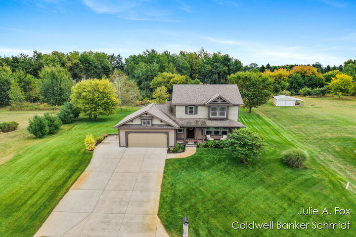 Property Photo:  9110 Nature Meadows Drive NE  MI 49341 