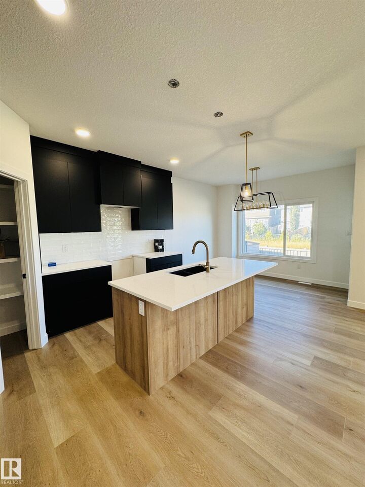 Property Photo:  3174 Magpie Way NW  AB T5S 0K9 