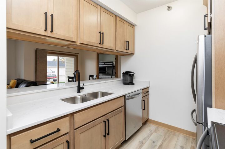 Property Photo: 1106 NE 5th Lane D13 IA 50021