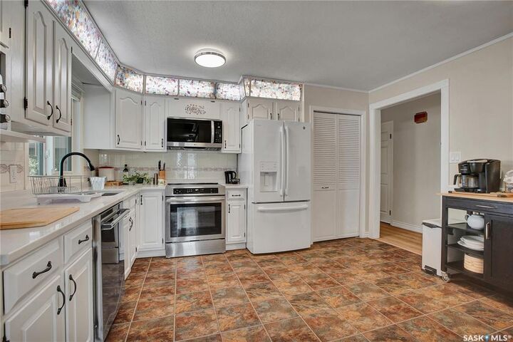 Property Photo:  128 Delaronde Road  SK S7J 3Y3 