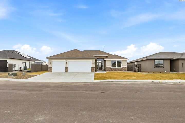 Property Photo:  8802 Silver Mound Dr  WA 99301 