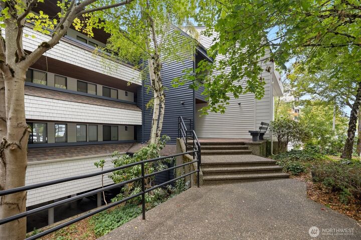 Property Photo:  3055  80th Avenue SE 107  WA 98040 