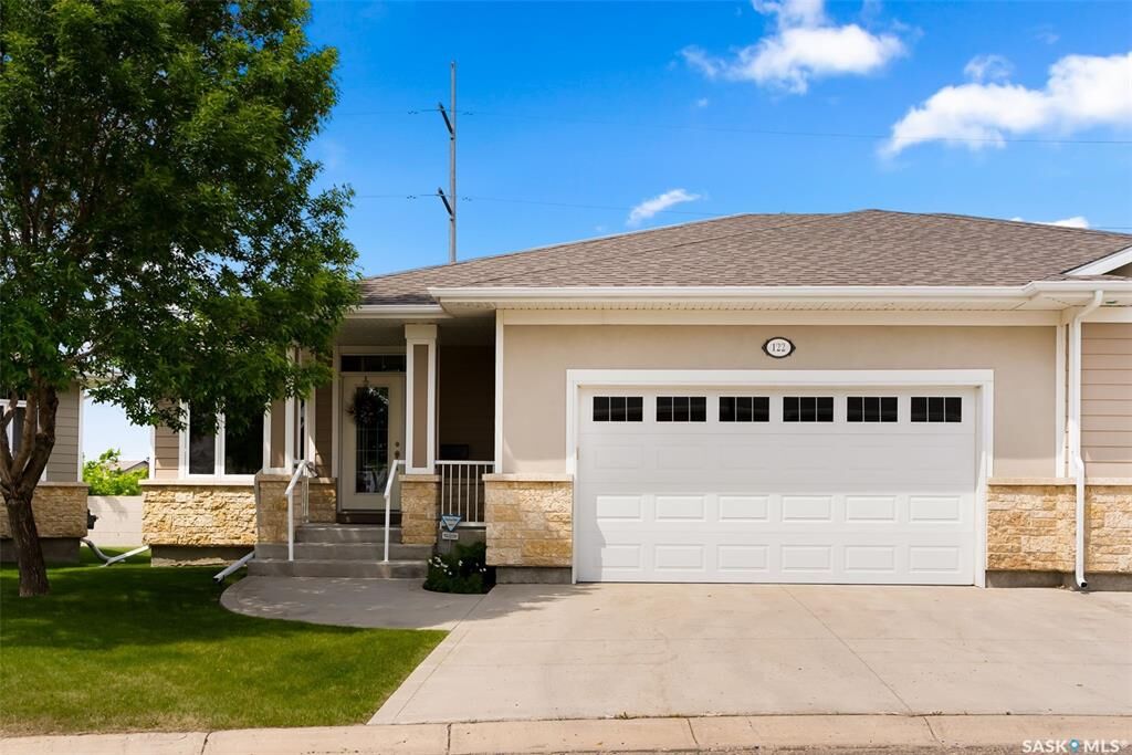 Property Photo:  122 Wintergreene Lane  SK S4S 0A7 