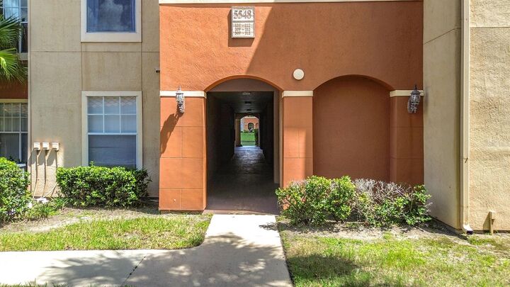 Property Photo: 5548 Metrowest Boulevard 209 FL 32811